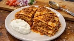 Tavada kat kat Kayseri Yağlaması: sulu kıymalı harçla yumuşacık sonuç