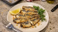 Mısır unuyla çıtır fırında sardalya: kokusuz, zahmetsiz balık tarifi