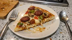 Tek hamurla bir tepsi dolusu: yumuşacık ev usulü tepsi pizzası tarifi