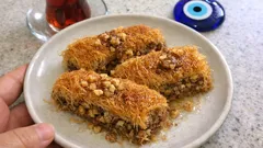 Cevizli tel kadayıf tarifi: kat kat bastırıp fırınlayın, çıtır çıtır şerbeti çeksin